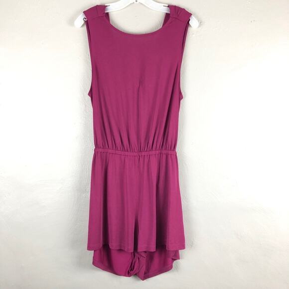 Silence + Noise Purple Fuchsia Cut Out Twist Back Jersey Knit Sleeveless Romper - Picture 1 of 4